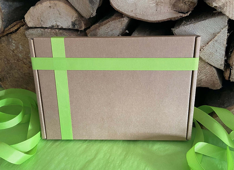 Sock packaging with green ribbon